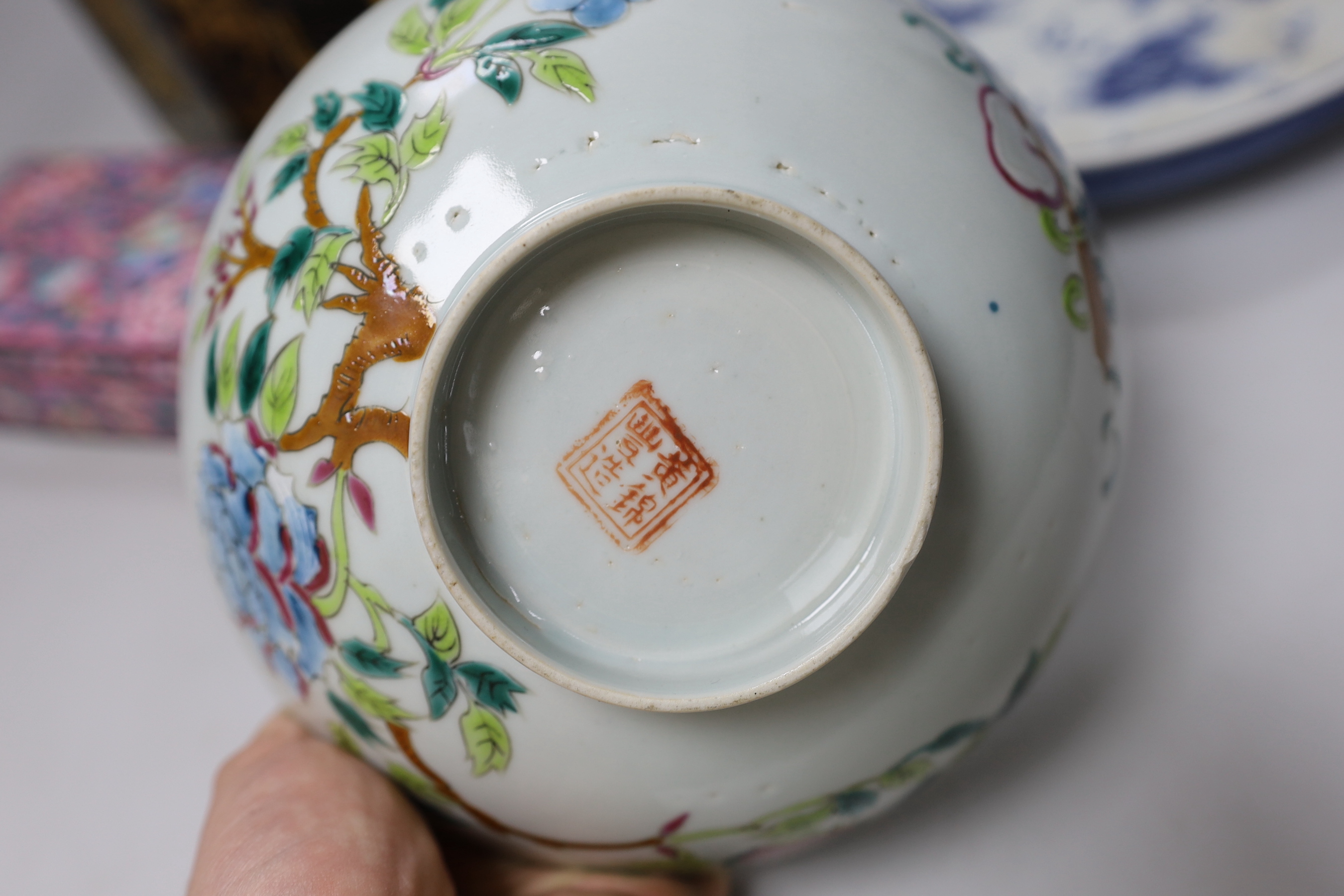 A Chinese blue and white dish, a famille rose bowl, a Canton enamel box and cover and a gilt decorated lacquer box and cover